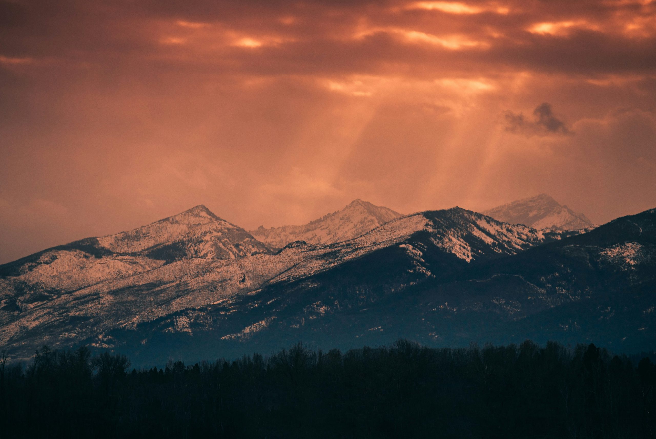 Mountains in Missoula, Montana with sunset coming through